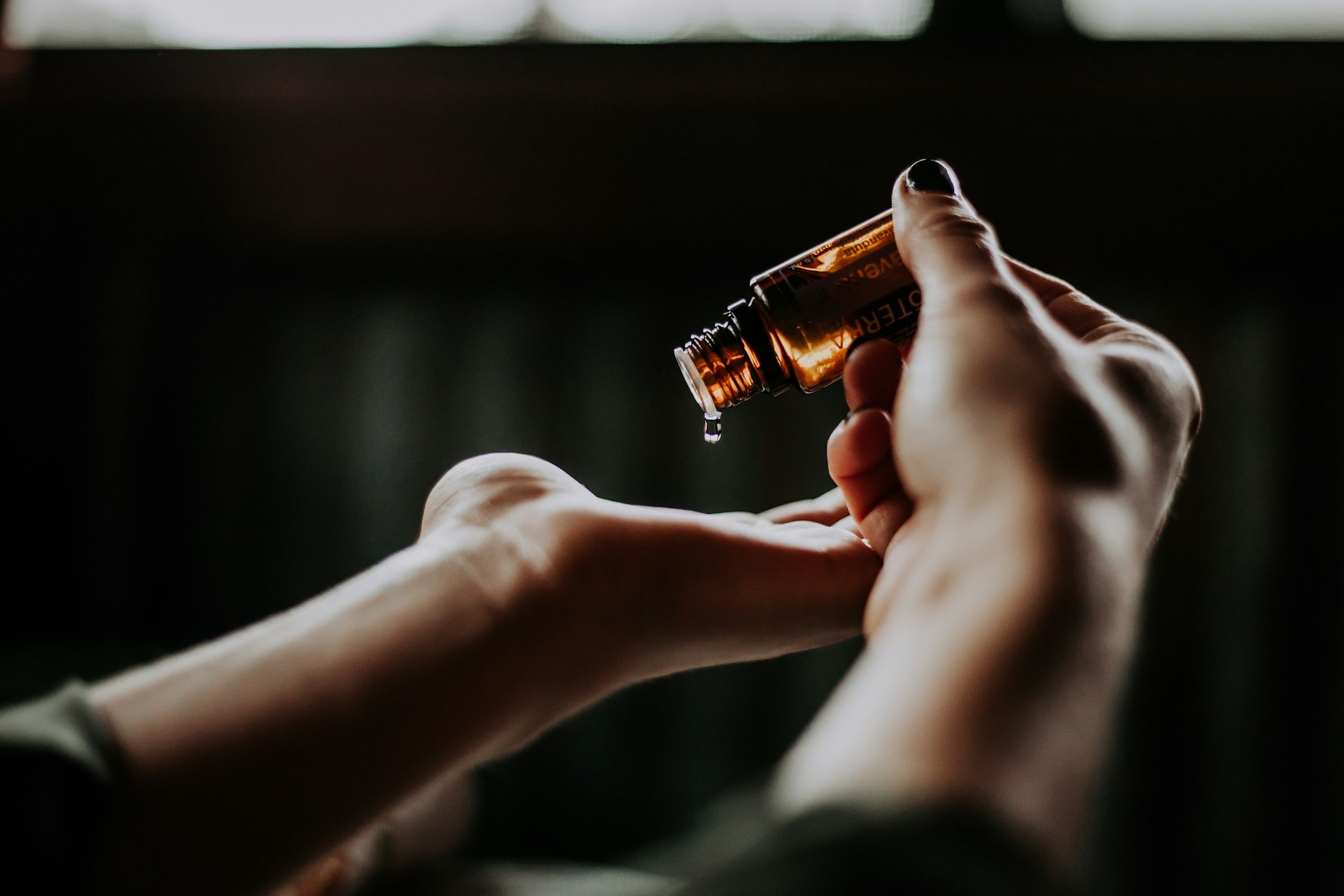 Getting lotions ready before applying reflexology techniques massage fort lauderdale gay