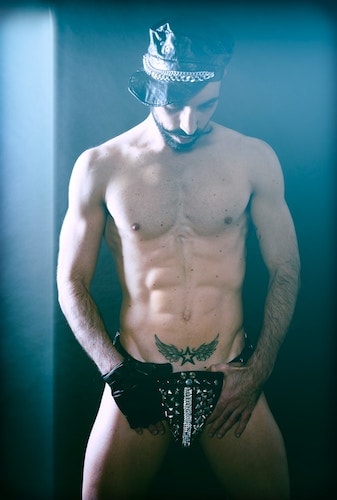 Gay man in leather ready for a bodywork session at Ramrod
